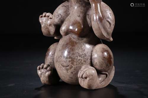 A Chinese Carved Gaogu Jade Beast Ornament