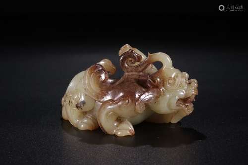 A Chinese Carved Hetian Jade Beast Ornament