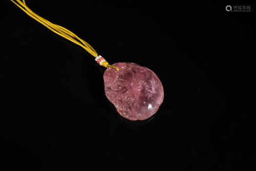 A Chinese Pink Jade Peach-shaped Pendant