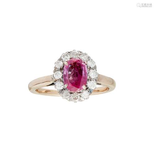 A pink sapphire and diamond ring