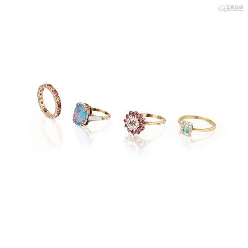 A collection of four gem set rings