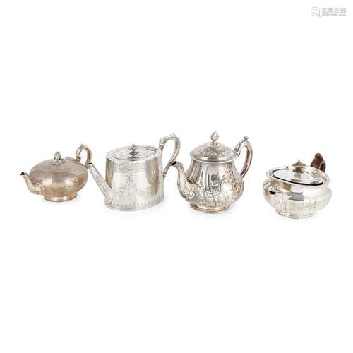 A collection of four teapots