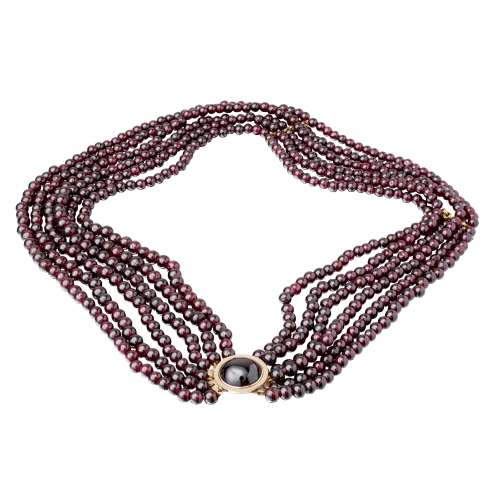 A six strand garnet bead necklace