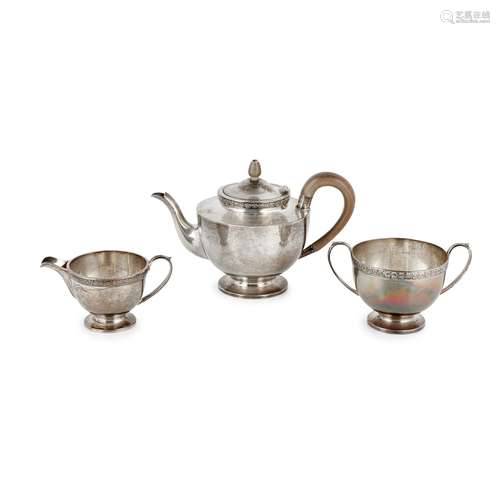 A matched three piece tea service