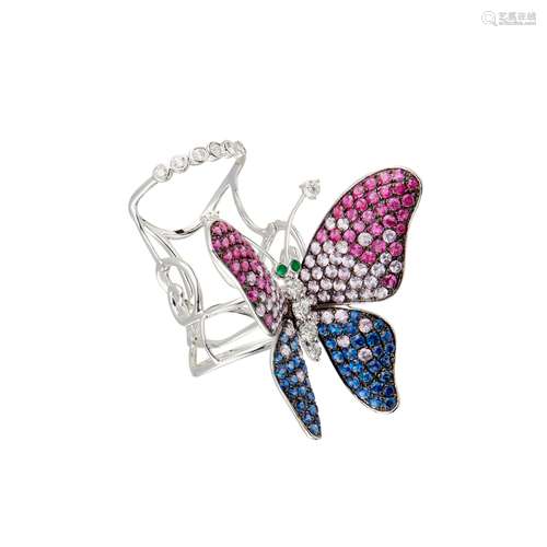 A multi-gem set butterfly ring