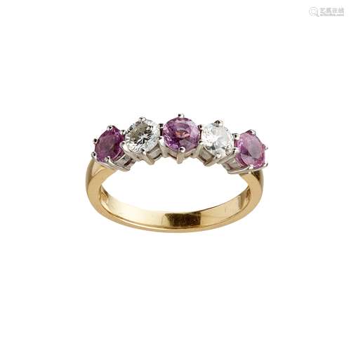 A pink sapphire and diamond set five stone ring