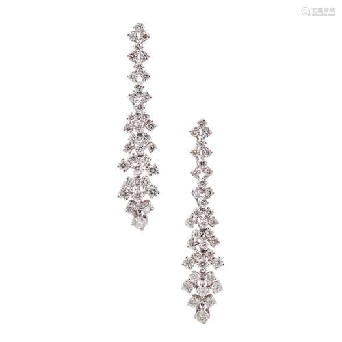 A pair of diamond set pendant earrings