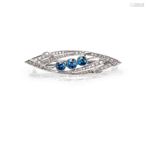 A sapphire and diamond set brooch