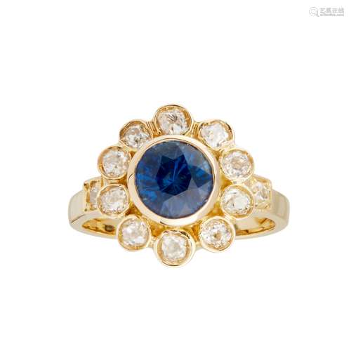 A sapphire and diamond cluster ring