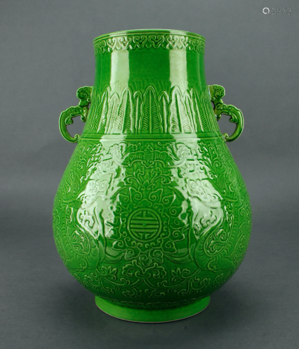 BRIGHT GREEN CARVED ARCHAIC DRAG…