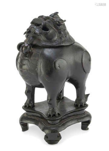 A CHINESE BRONZE CENSER SHAPED AS GUARDIAN LION. 19TH CENTURY.