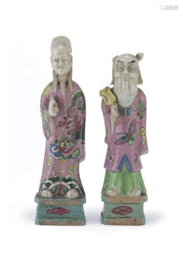 TWO CHINESE POLYCHROME ENAMELED PORCELAIN SCULPTURES OF TAOIST DIVINITY. EARLY 19TH CENTURY.