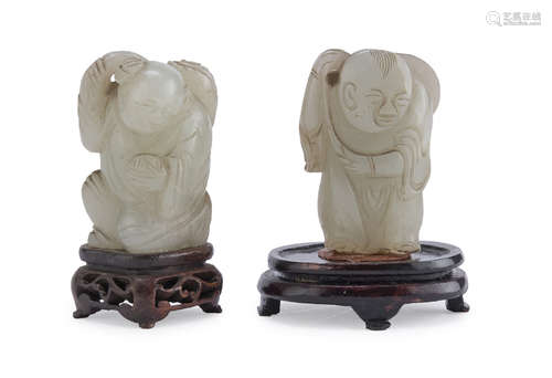 TWO CHINESE JADE SCULPTURES OF ATTENDENTS. 20TH CENTURY.