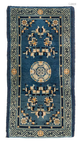 A SMALL CHINESE BEIJING CARPET WITH BLUE GROUND LATE 19TH CENTURY.