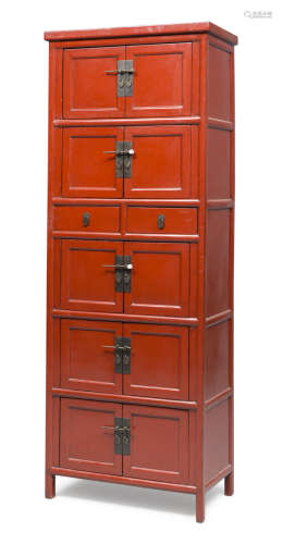 A CHINESE RED LAQUER WOOD CABINET. 20TH CENTURY.