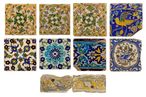* NINE POTTERY TILES WITH FLORAL DECORATION