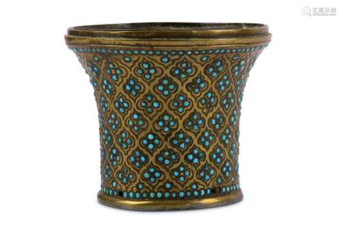 * A TURQUOISE-SET GILT-COPPER QALYAN CUP