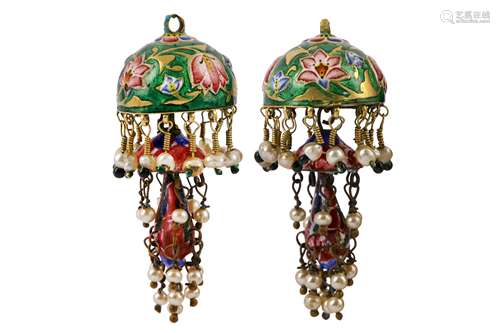 * A PAIR OF QAJAR POLYCHROME-ENAMELLED GILT-COPPER EARRINGS