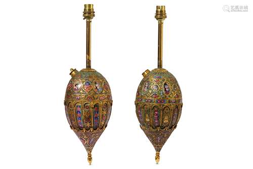 * A NEAR PAIR OF QAJAR POLYCHROME-ENAMELLED GILT-COPPER QALYAN BOTTLES