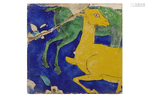 * A SAFAVID CUERDA SECA POTTERY TILE WITH DEER