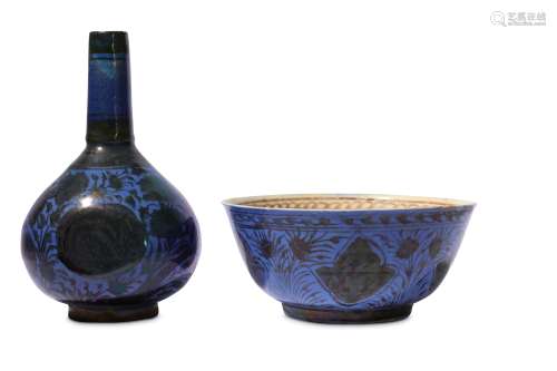 * A SAFAVID COPPER-LUSTRE AND BLUE POTTERY BOWL AND BOTTLE