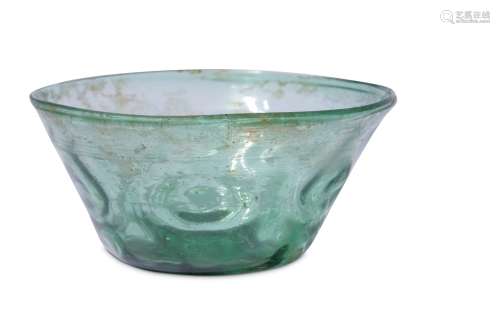 * A SMALL GREEN MOULD-BLOWN CLEAR-GLASS BOWL