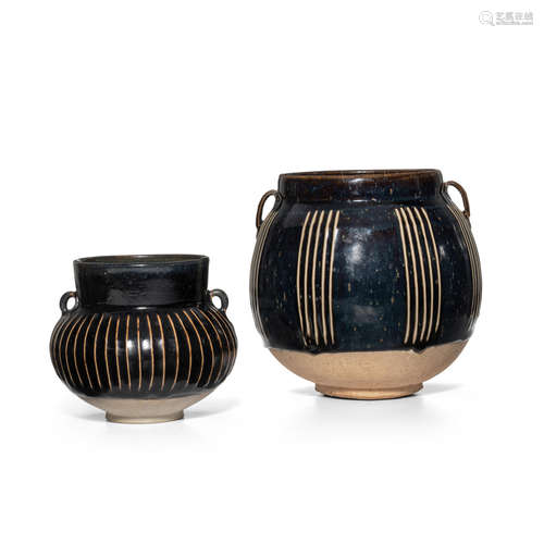 TWO CIZHOU-TYPE BLACK-GLAZED RIBBED JARS 12th century