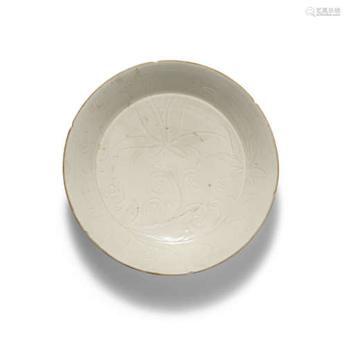 A DINGYAO CARVED 'DAY-LILY' DISH Song/Jin Dynasty