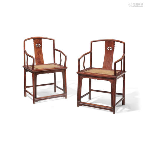 A PAIR OF HUANGHUALI CONTINUOUS YOKEBACK ARMCHAIRS, NANGUANMAOYI Late 19th/early 20th century