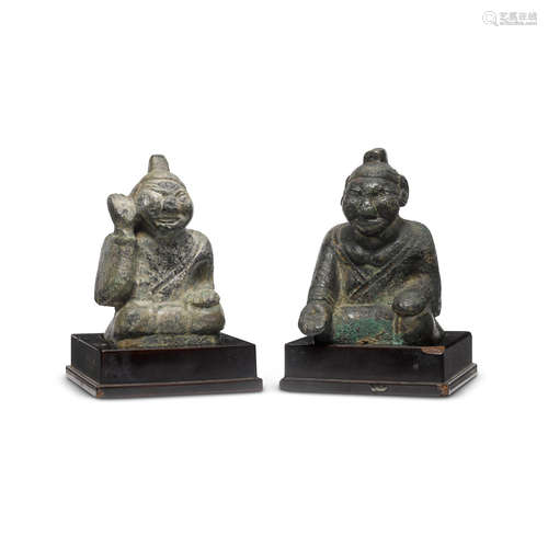 TWO BRONZE FIGURAL MAT WEIGHTS Han dynasty