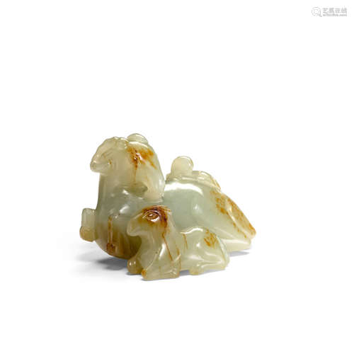 A CELADON JADE 'THREE RAMS' CARVING Qing dynasty