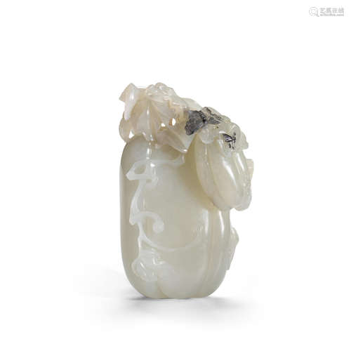 A WHITE JADE 'MELON AND BUTTERFLY' CARVING