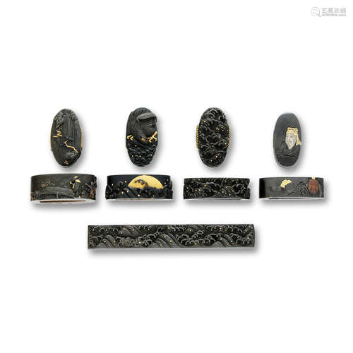 Two pairs of shibuichi fuchi-gashira, two pairs of shakudo fuchi-gashira, and a shibuichi kozuka The first by Ito Tadayasu, Edo period (1615-1868), 18th/19th century