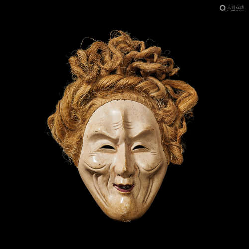 A small wood mask of an aged woman Edo period (1615-1868), 17th/18th century