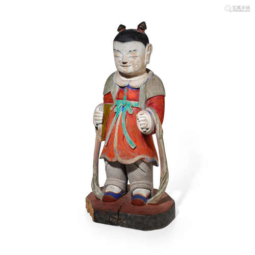 A fine wood figure of a Dong Ja (Boy Attendant) Joseon dynasty (1392-1897), dated 1706