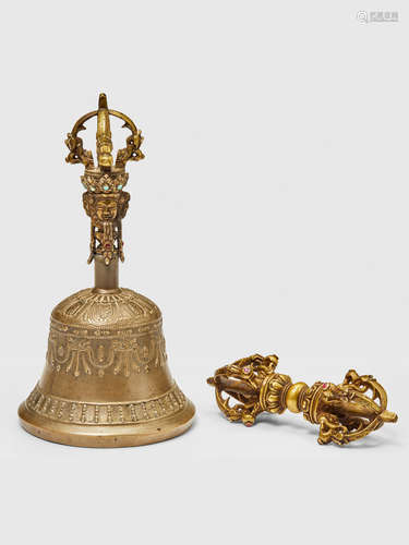 A GILT COPPER ALLOY VAJRA AND GHANTA SET TIBET, CIRCA 16TH CENTURY