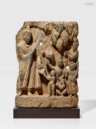 A SCHIST PANEL WITH THE OFFERING OF A HANDFUL OF DUST ANCIENT REGION OF GANDHARA, 2ND/3RD CENTURY