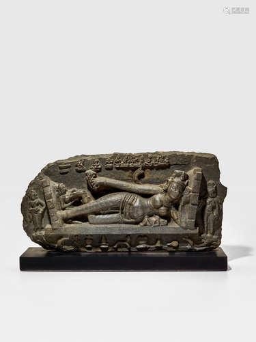 A BLACKSTONE STELE WITH GAURI AND BABY SADYOJATA (SHIVA) BIHAR, PALA-SENA PERIOD, CIRCA 11TH CENTURY