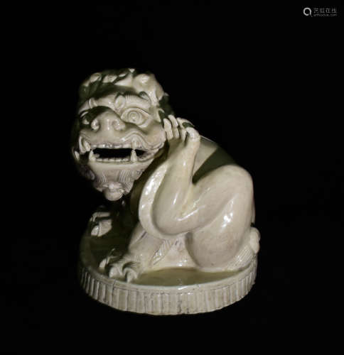 A DING KILN WHITE GLAZE LION IN SONG DYNASTY