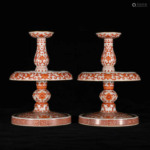 A PAIR OF ALUM RED CANDLESTICKS IN QIANLONG PERIOD