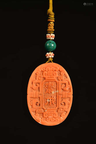 A Chinese Carved coral Pendant