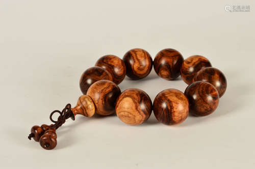 A Chinese Rose Wood Beads Hand String