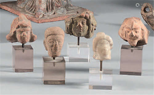 Set of five anthropomorphic heads including a marb…