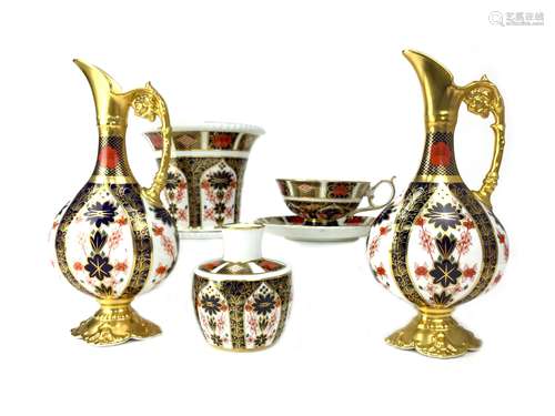 A PAIR OF ROYAL CROWN DERBY EWERS, VASES, CUP AND SAUCER