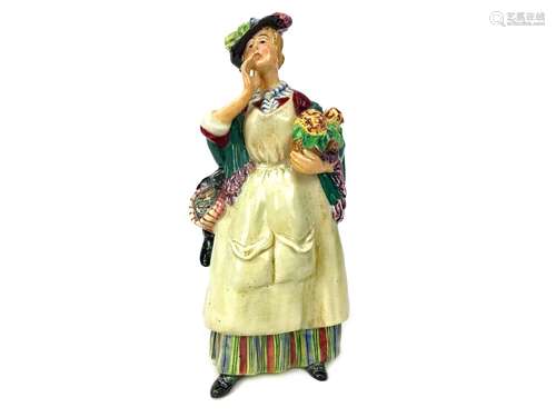 A ROYAL DOULTON FIGURE OF ODDS & ENDS