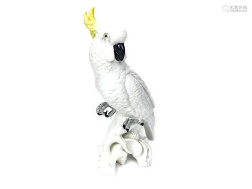 A ROYAL CROWN STAFFORDSHIRE COCKATIEL