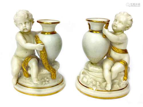 A PAIR OF WORCESTER KERR AND BINNS SPILL VASES