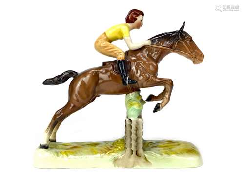 A BESWICK FIGURE OF A HORSE AND RIDER