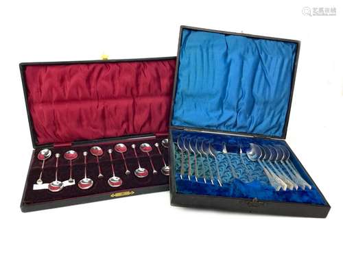 A CASED SET OF TWELVE SILVER SEAL TOP COFFEE SPOONS