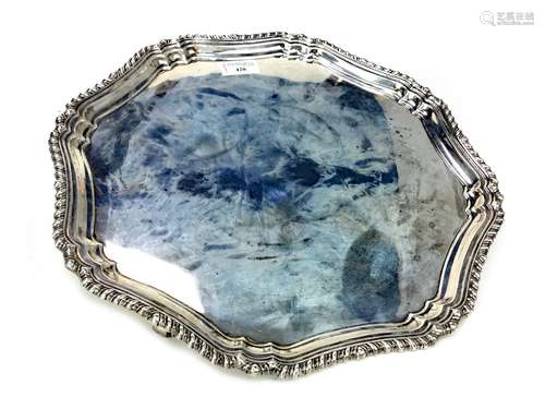 AN EARLY 20TH CENTURY SILVER SALVER